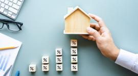 Pourcentages et petite maison pour illustrer les leviers de la défiscalisation immobilière