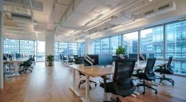 Photo de bureaux en open-space illustrant une scpi de bureaux