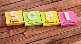 Photo de post-it avec les lettres SCPI posees dessus